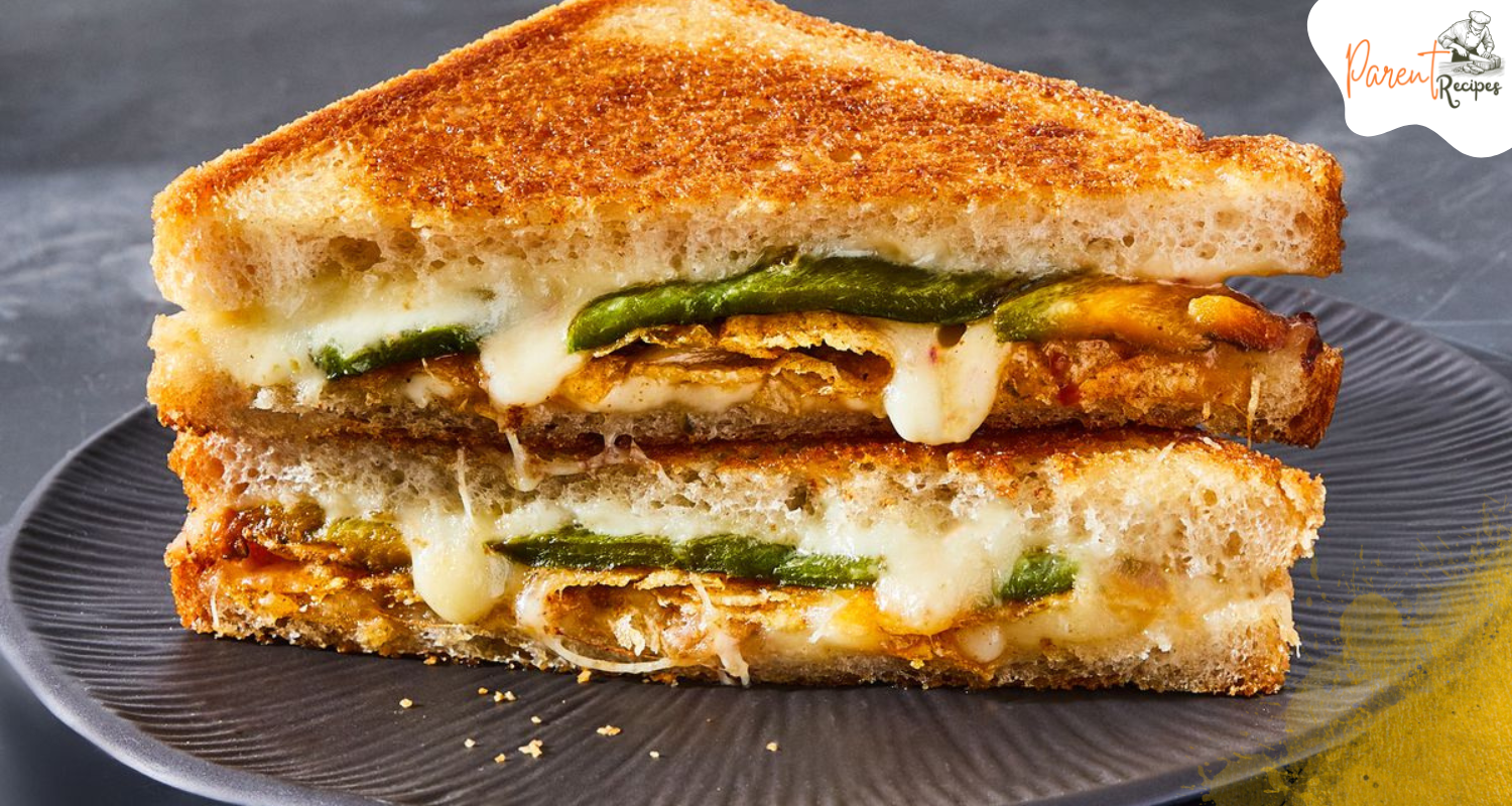 "Close-Up of Jalapeño Popper Grilled Cheese Sandwich" A mouthwatering close-up shot of a grilled cheese sandwich oozing with melted cheddar, jalapeño bits, and cream cheese.